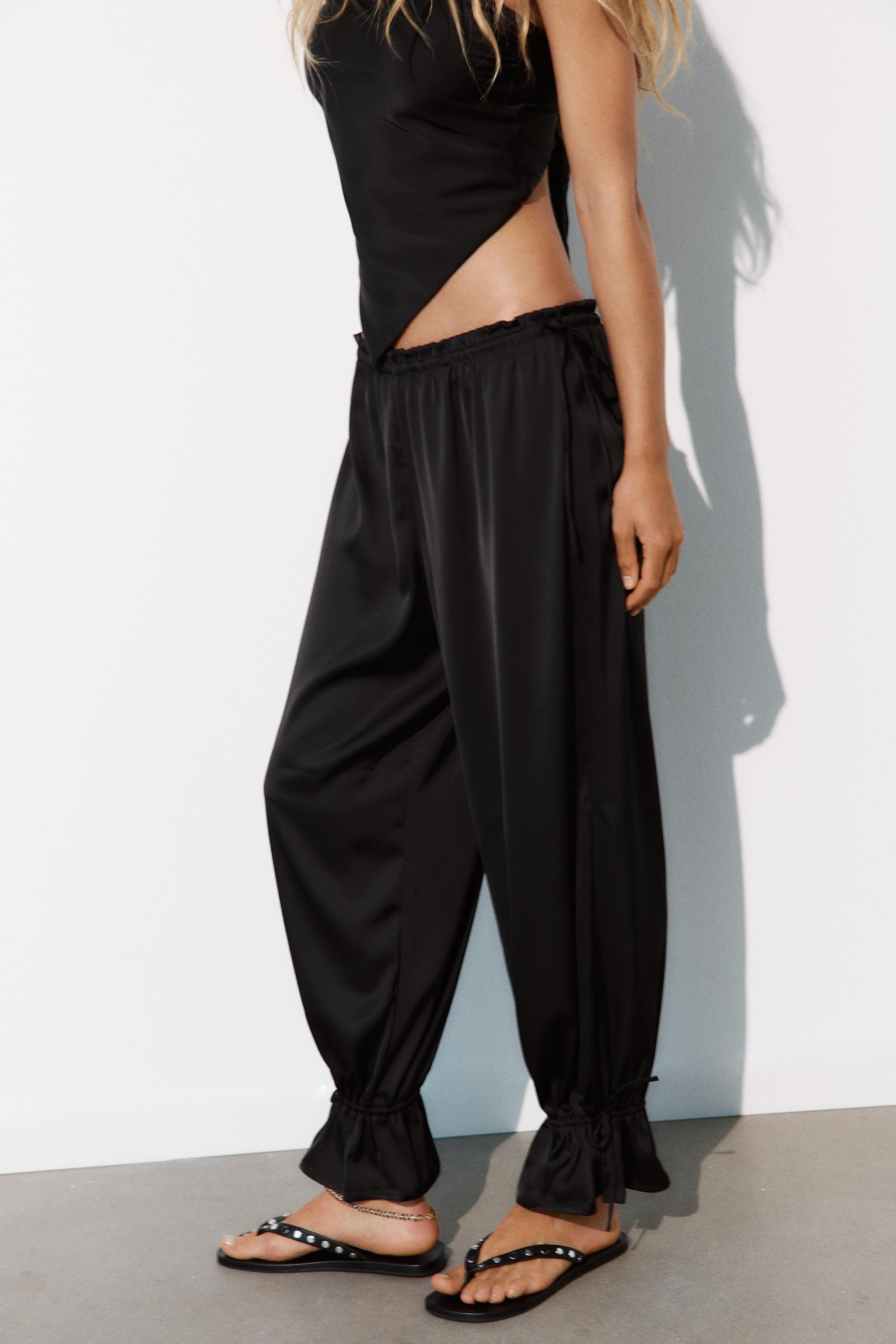PANTALON BOUFFANT À RAYURES ET NŒUDS